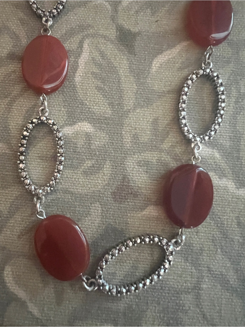 Silver-Tone Necklace with Deep Red Oval Beads